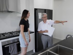 Barry talking with a client