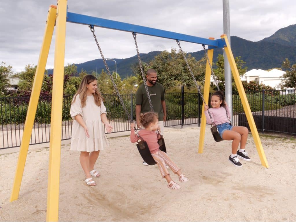 family at the swing set
