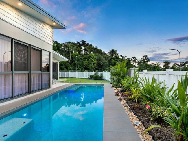 image-16 pool built next to a retaining wall home in cairns